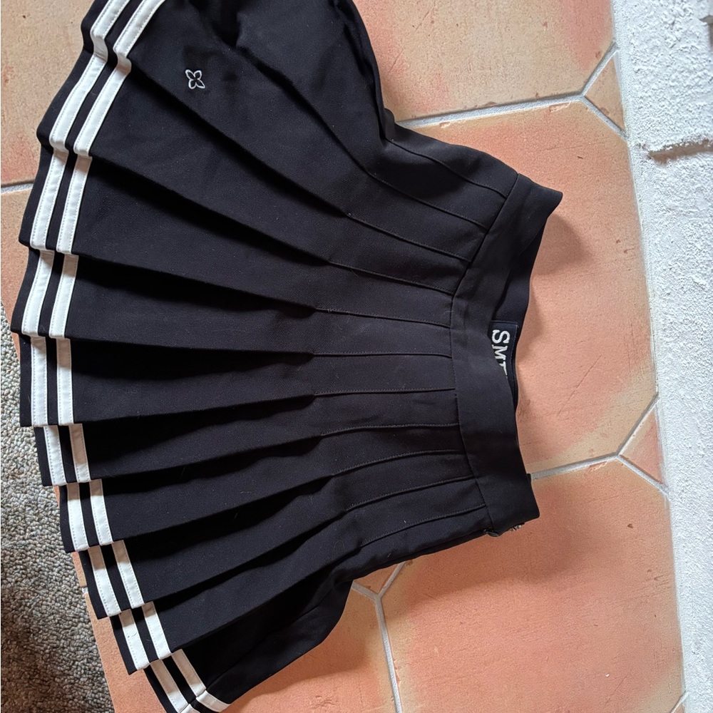 Elegant Black Pleated Mini Skirt with White Trim